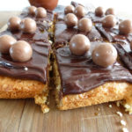 Gluten Free Soft Cookie Bars with Maltesers and Chocolate Cream Cheese Frosting